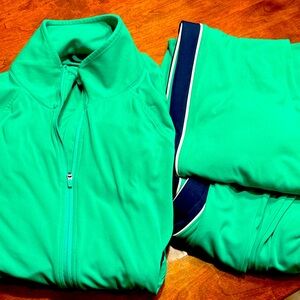 Vibrant Green Athletic Jacket and Pants Set. Full zipper jacket with pockets.